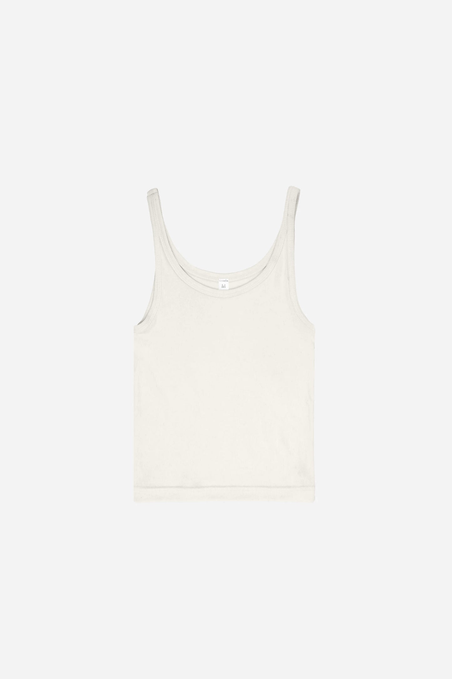 Flat lay showing the rectangular and semi-cropped torso shape.