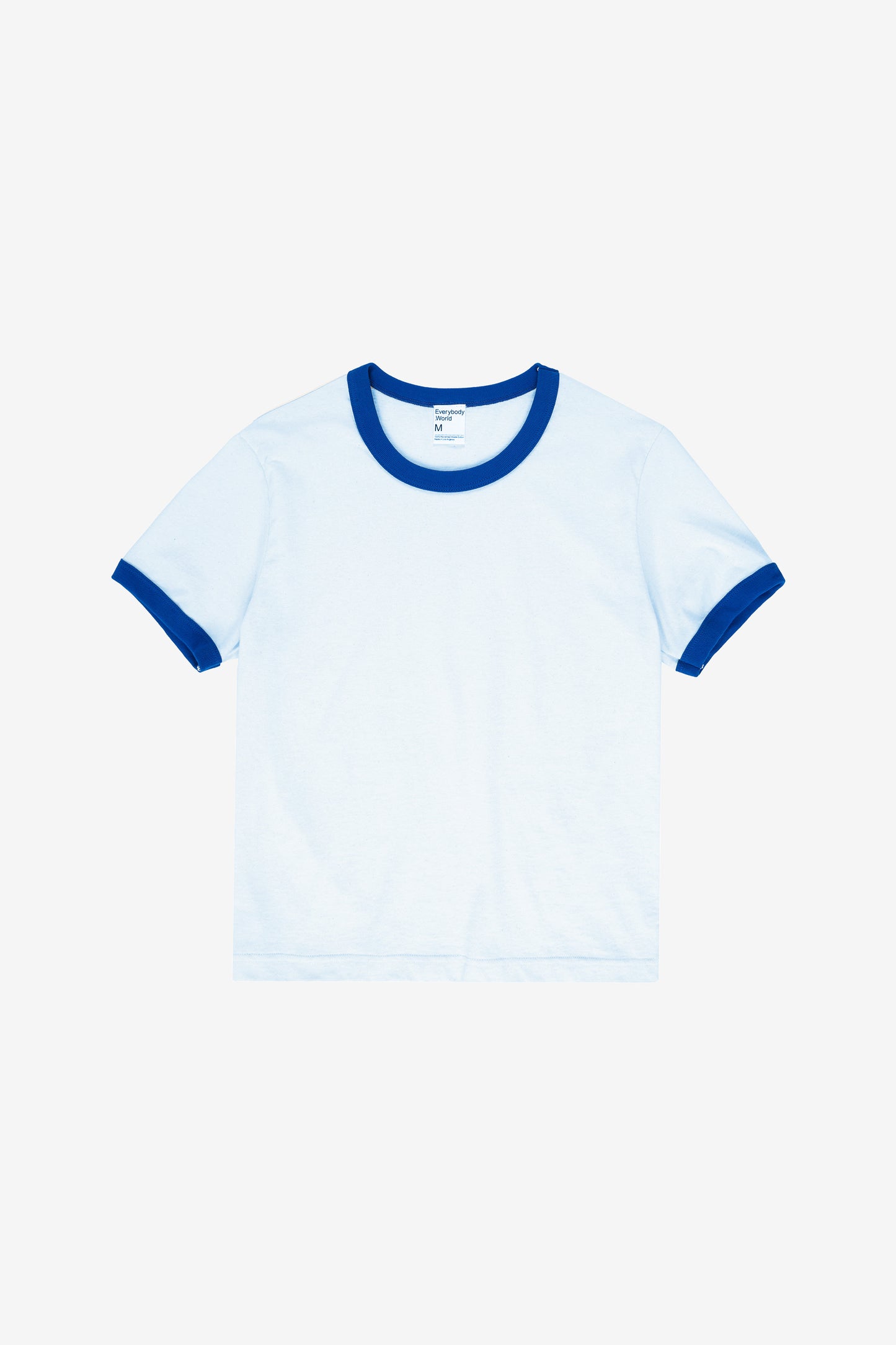 Flat lay showing the slim rectangular body and sleeves.