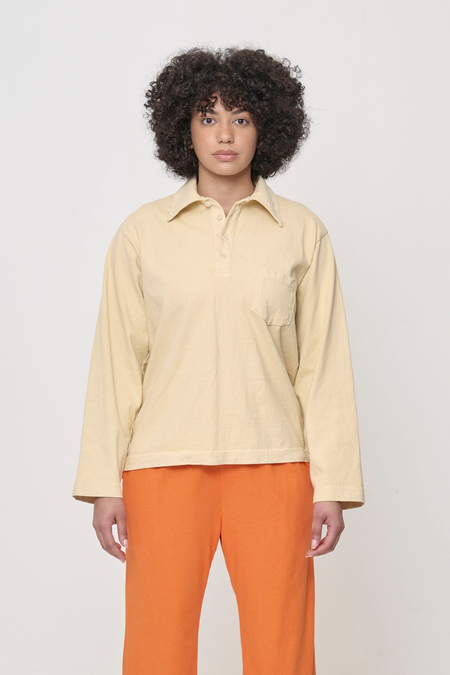 Front view of a 5'8" person wearing a size S Rugby Trash Polo in Turtle Dove. Hem hits mid-hip.