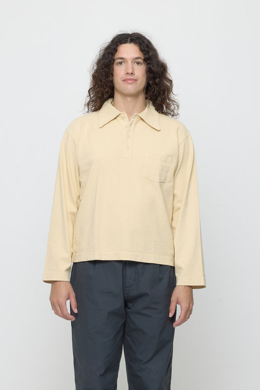 A 6' person wearing a size S Rugby Trash Polo in Turtle Dove. Hem hits mid-hip.