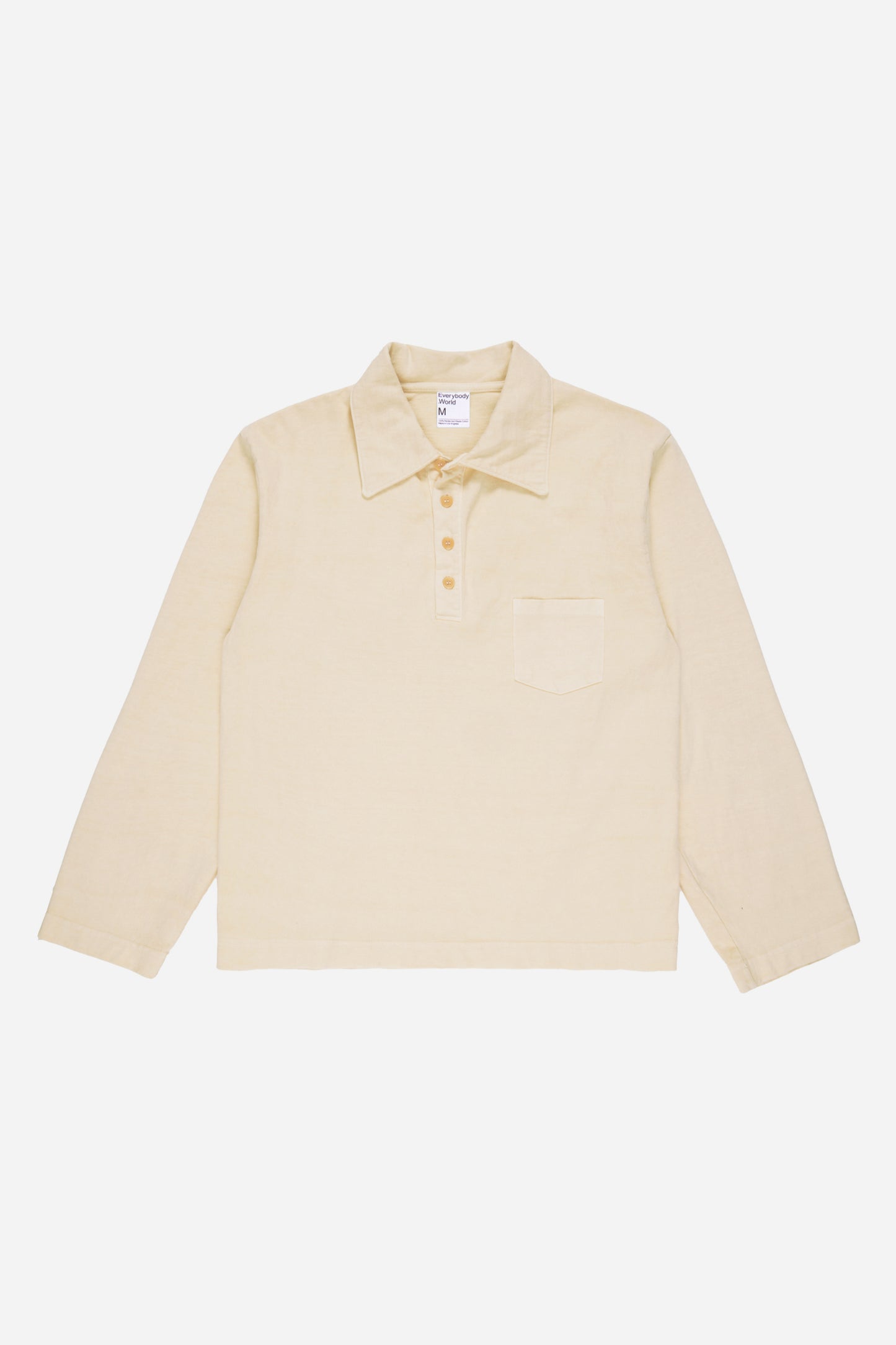 Flat lay of the Turtle Dove Rugby Trash Polo, showing color, buttons, and front pocket.