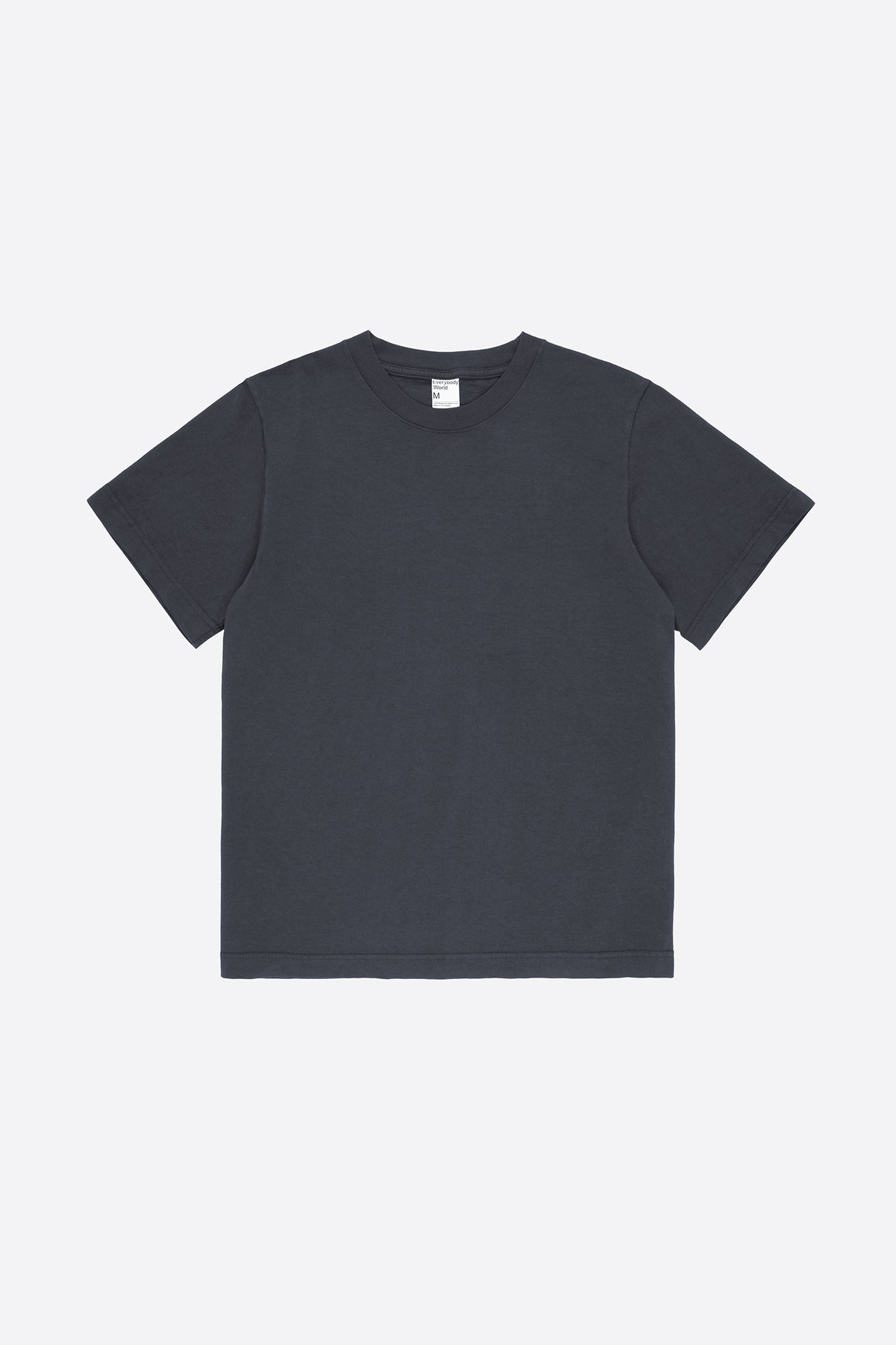 Flat lay of the Short Sleeve Trash Tee in Slate, showing the classic cut of the nearly black colored garment.