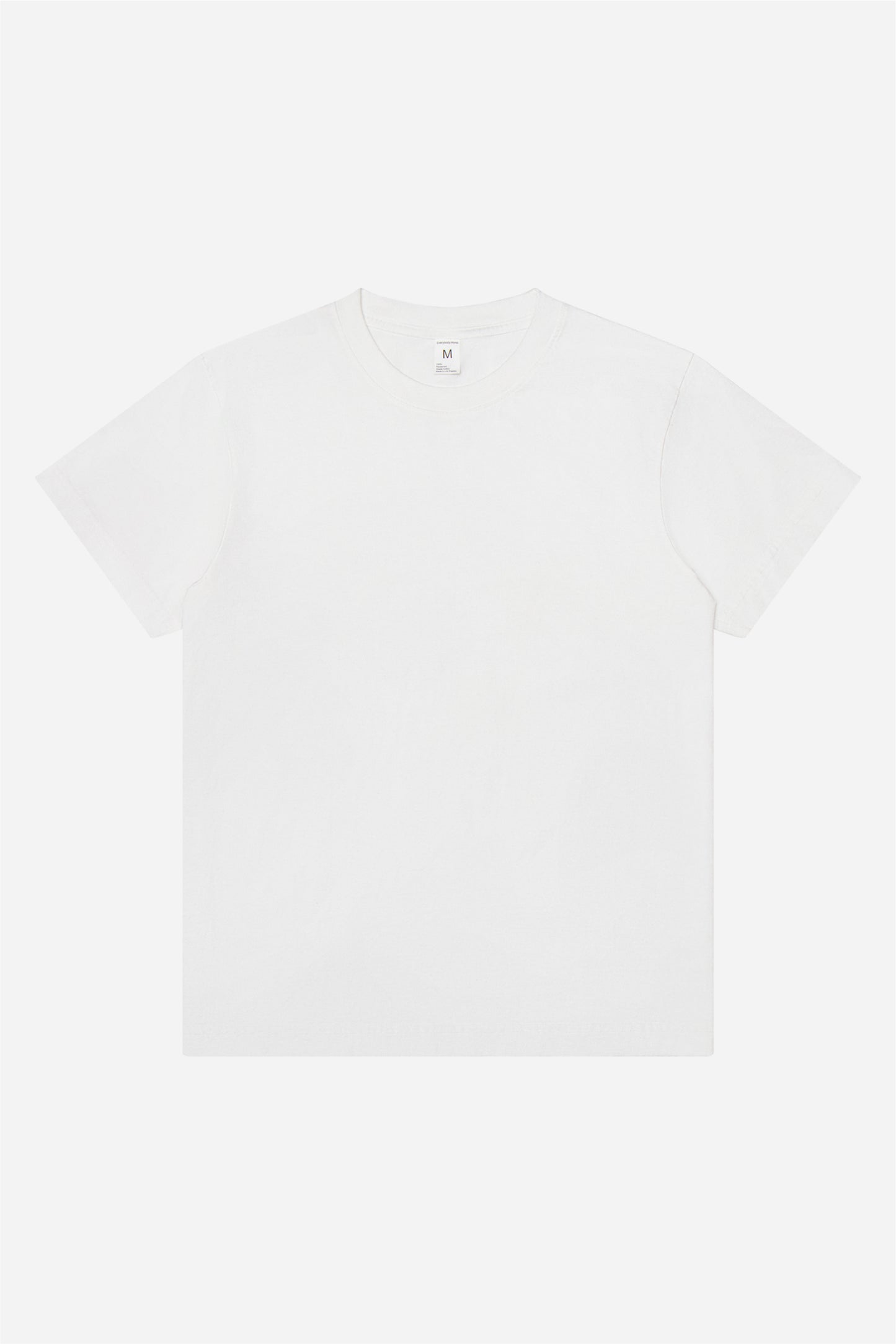 Flat lay of a White Short Sleeve Trash Tee.