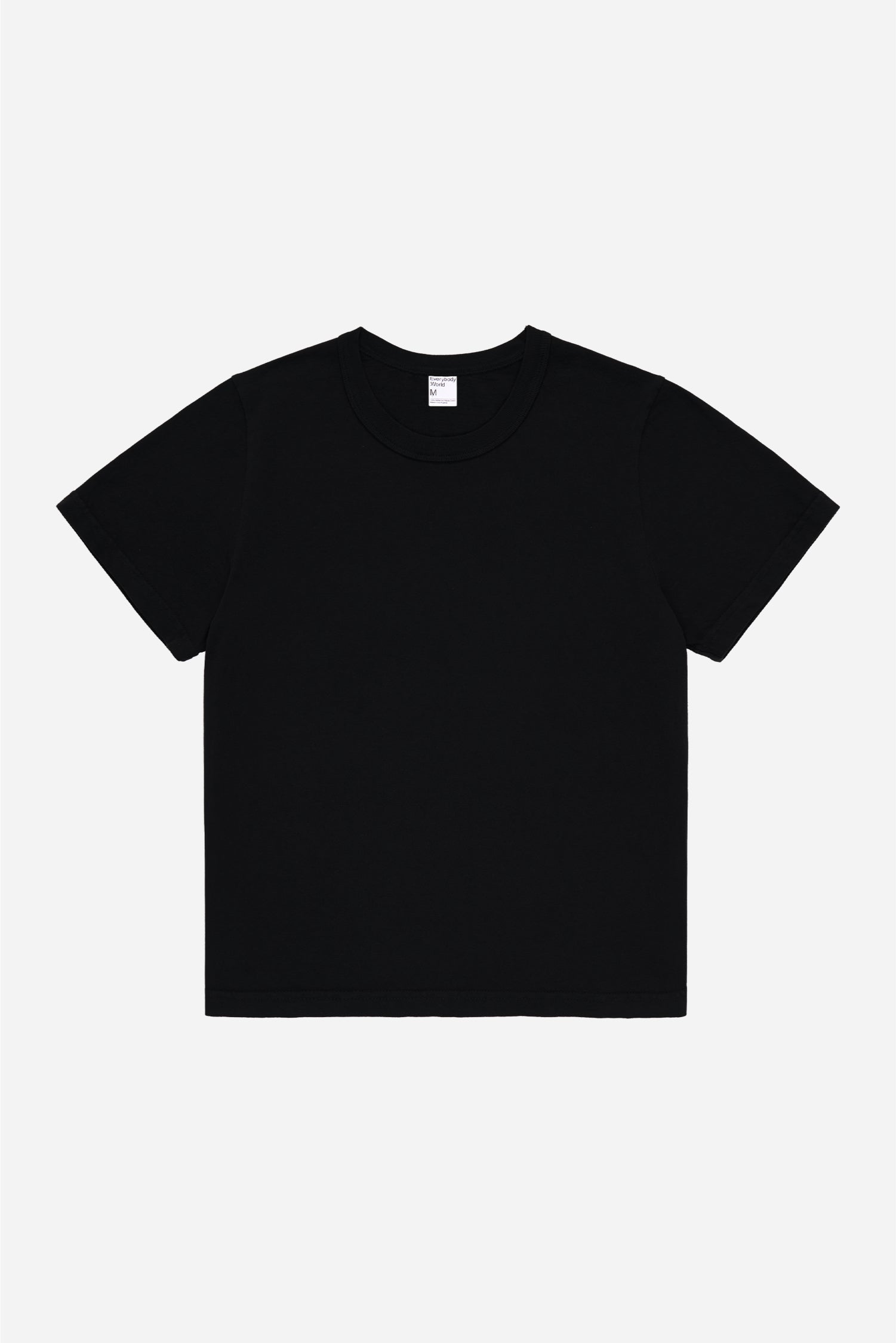 Flat lay of Black Tailored Trash Tee, front view