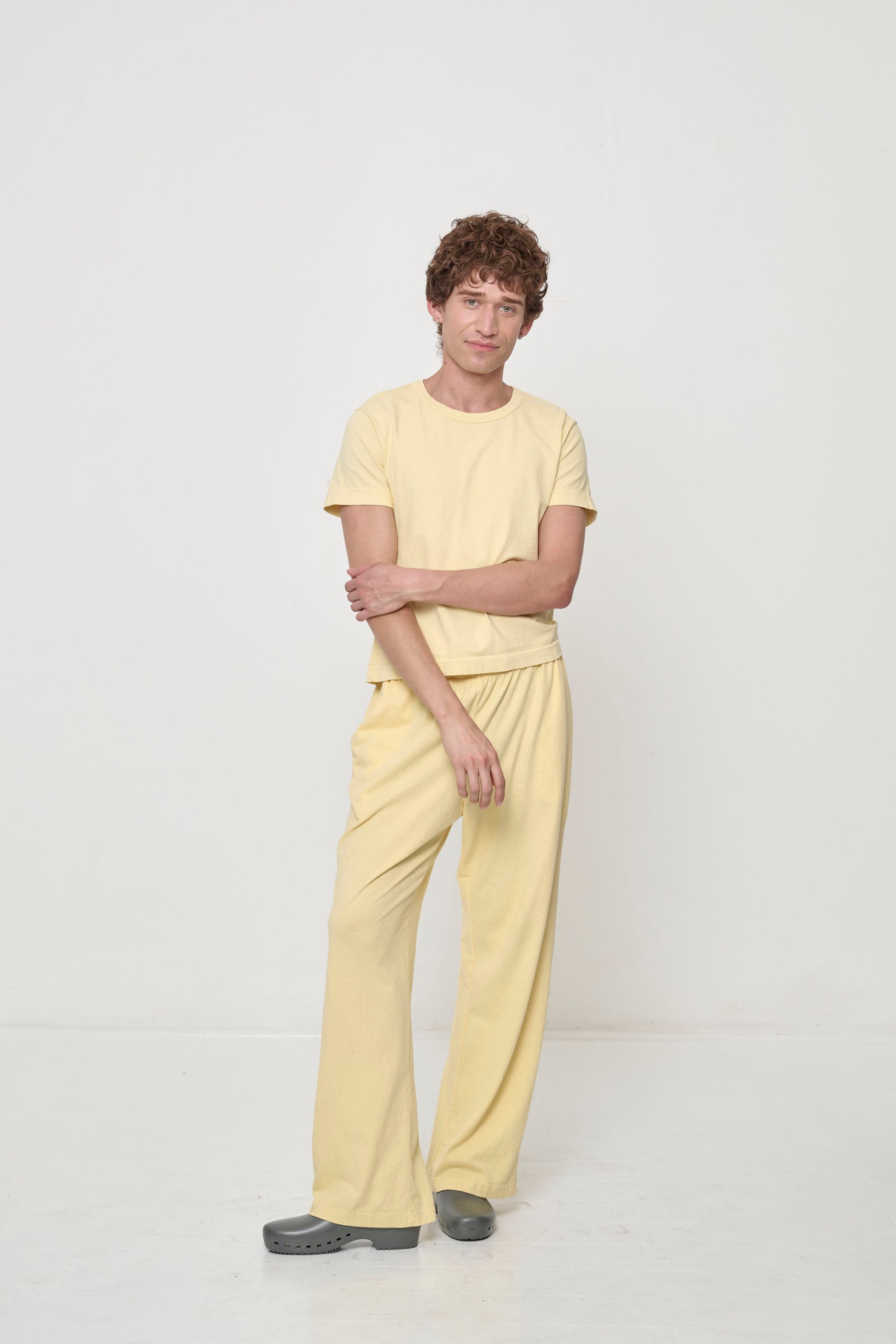 Person wearing French Butter Tailored Trash Tee with matching Apartment Pants