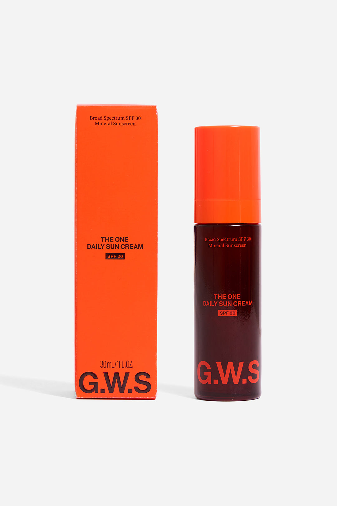 A bottle of The One Daily Sun Cream by Good Weather Skin, placed next to its orange packaging box.