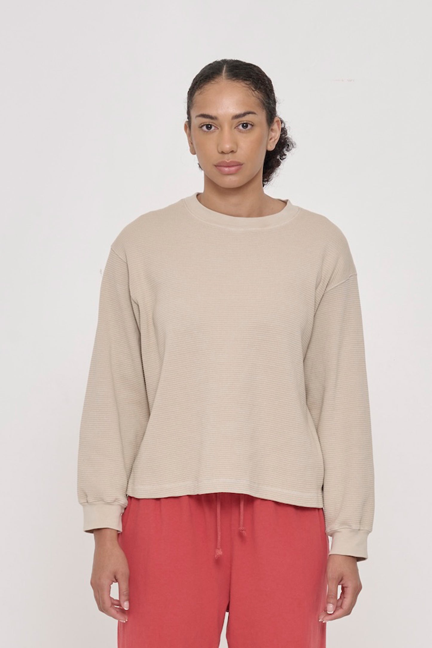 A 5'8" woman in an Oat Thermal Long Sleeve Boxier Trash Tee, size S. Bottom hem hits her upper-middle hip.