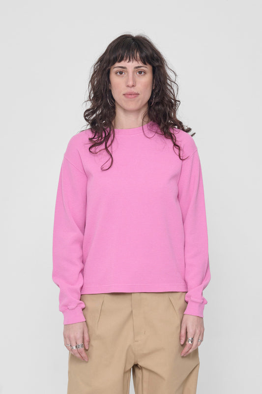 5'6" person in a size XS Pixie Thermal Long Sleeve Boxier Trash Tee. Hem hits the upper hip.