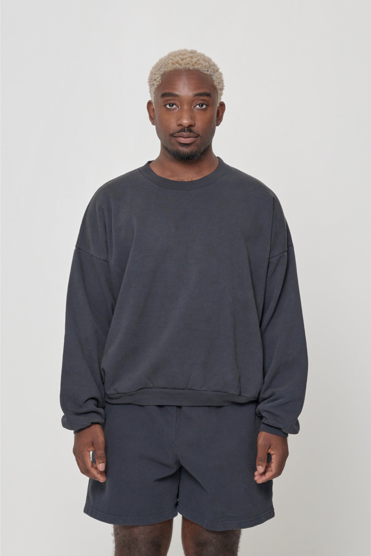 Front view: 5'9" man wearing Slate Trash Crewneck in size L. Hem hits his upper middle hip.