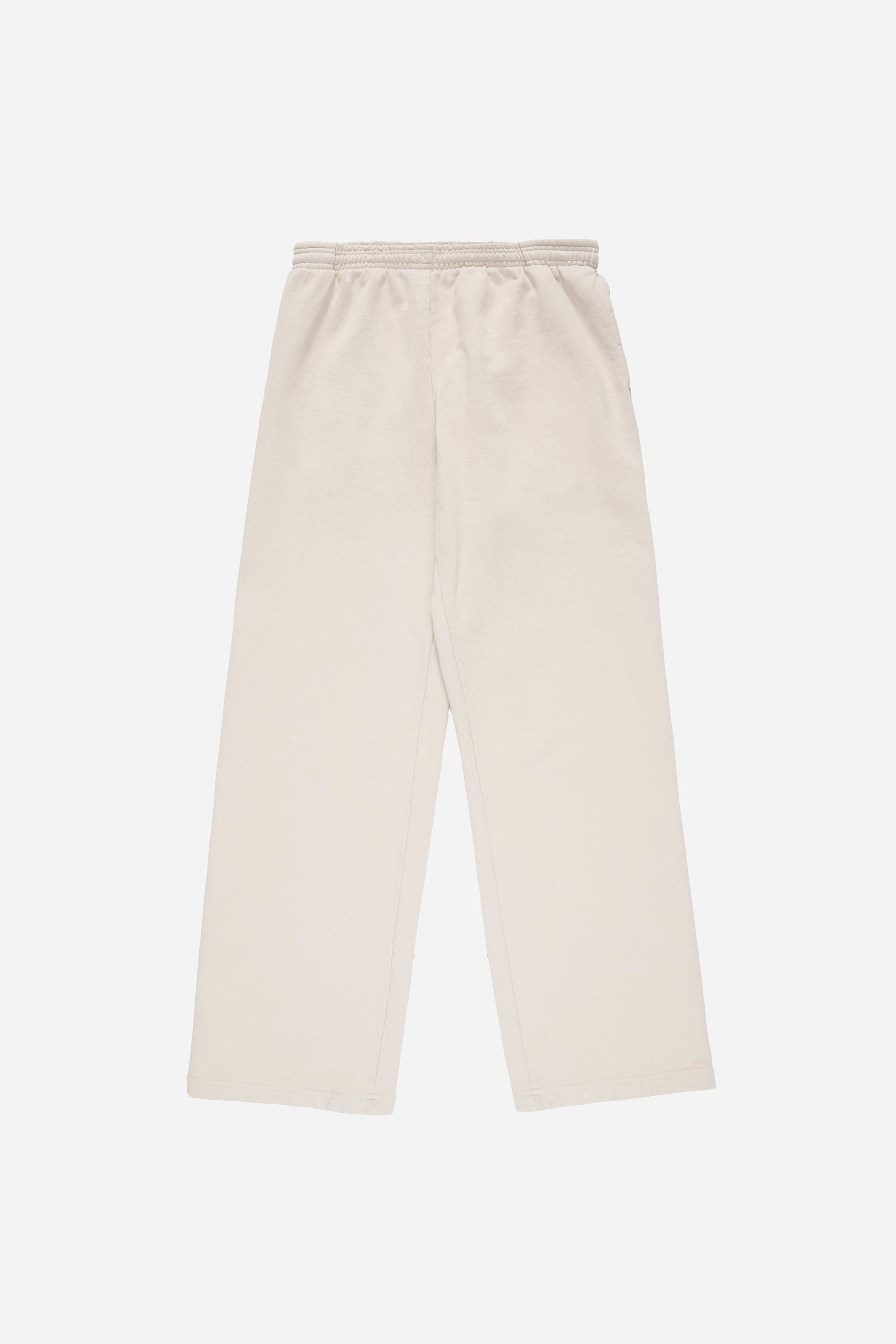 Flat lay of Trash Fleece Apartment Pants in Oat, showing the full length and straight leg of the relaxed-fit design.