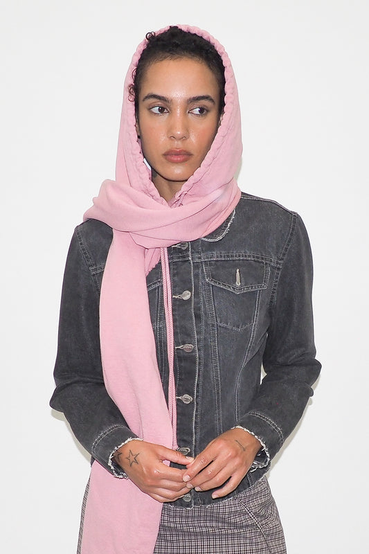 Wild Rose Clyde x Everybody.World Hoodie Scarf with one arm swept behind model.