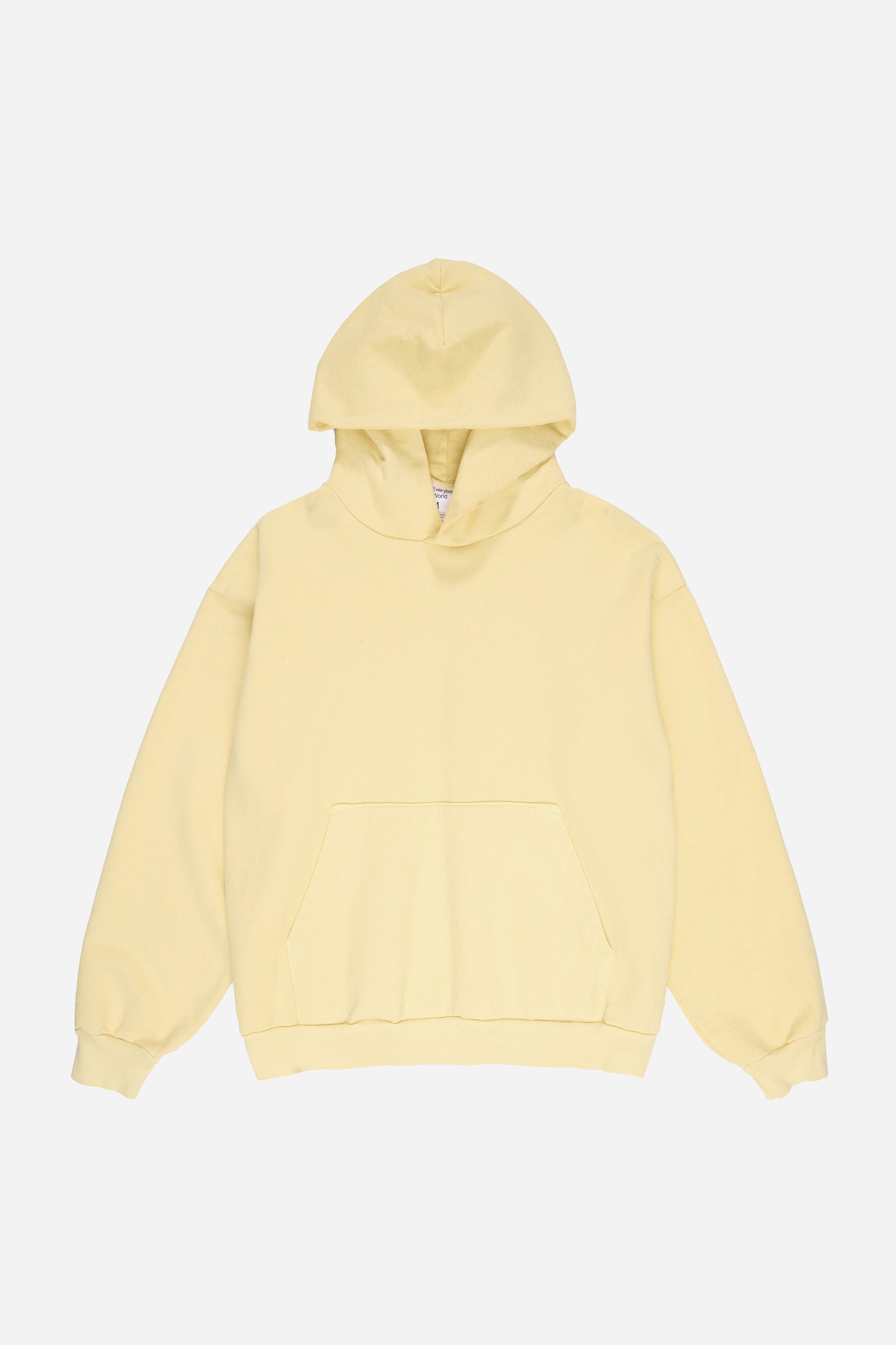 Flat lay front view of French Butter Trash Hoodie with hood lifted above the collar.