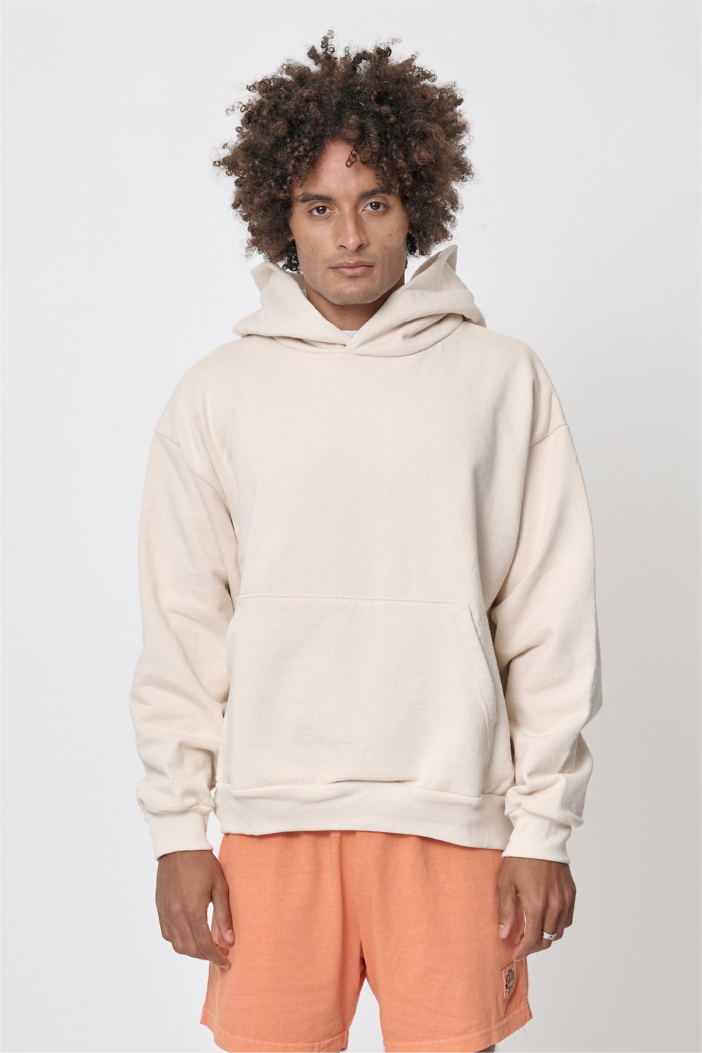 Front view: 6' man wearing Scour Trash Hoodie in size L. Hem hits his lower hip.