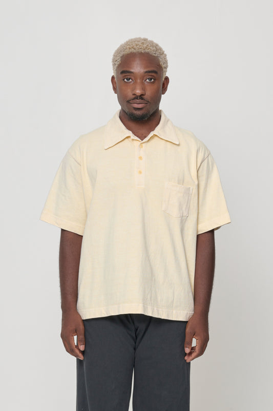Front view of a 5'9" man wearing a size XL Trash Polo in Turtle Dove. Hem hits his lower hip.