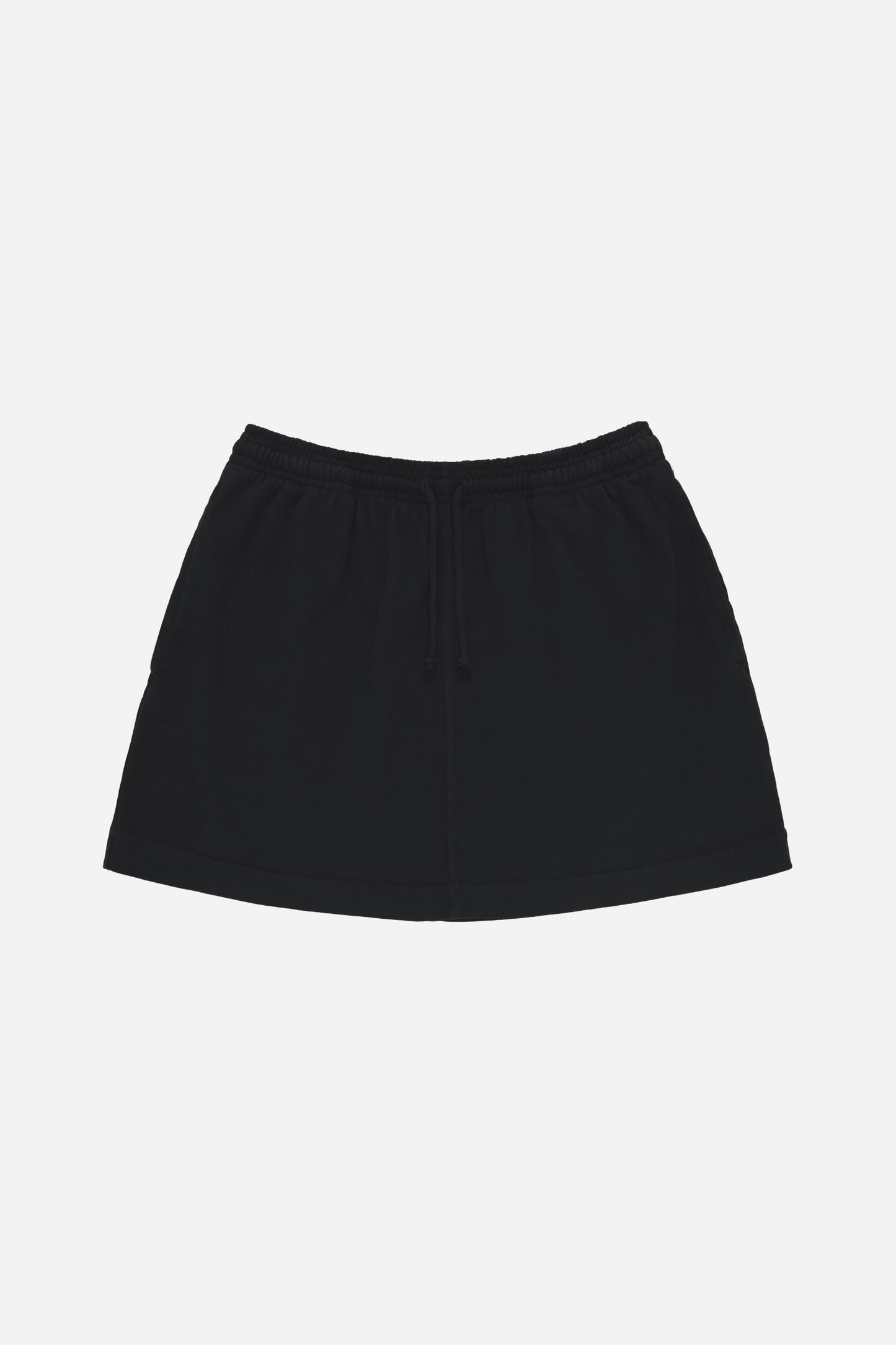 Flat lay front view of Black Trash Skirt showing slight a-line shape.