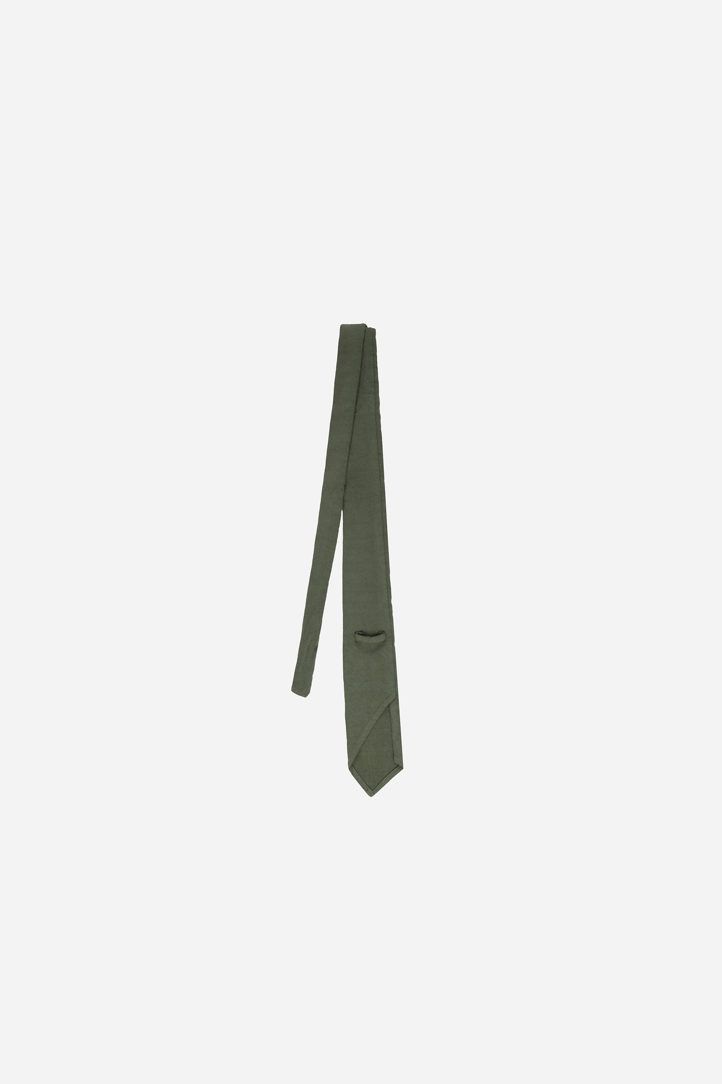 Back flat lay of Pine Trash Tie folded half way, showing loop and folded construction.