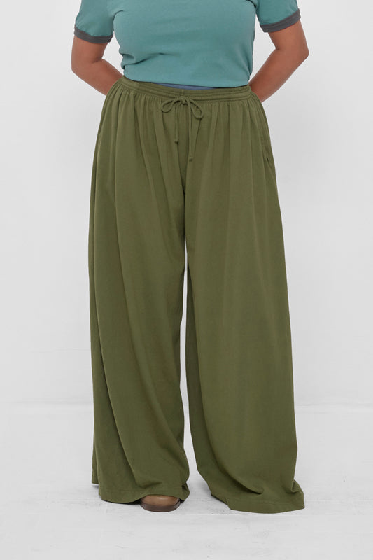 Tubular Pants in Olive – front view on model
