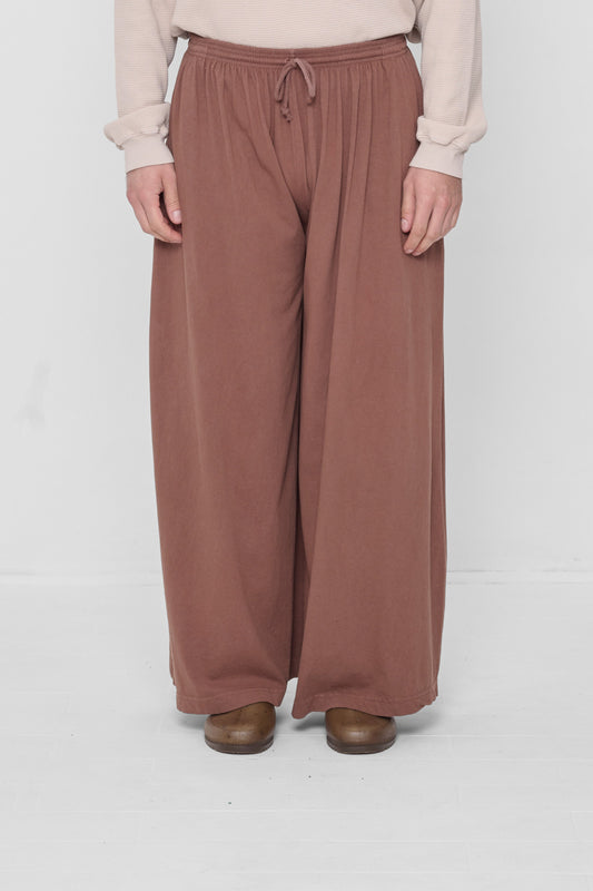 Waist down front view of Potting Soil Tubular Pants on 6'2" model.