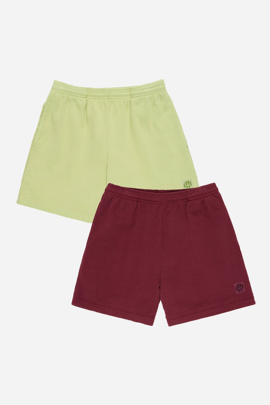 Flat lay of Cardamom light green and Burgundy shorts