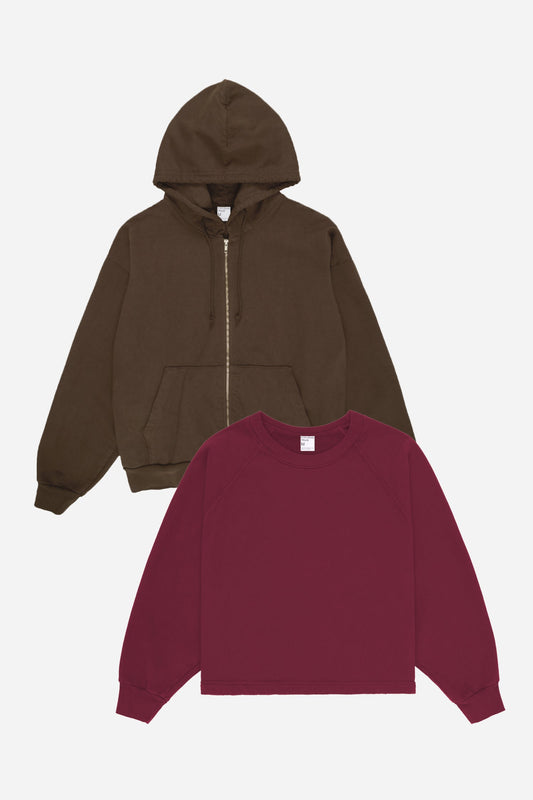 Flat lay of Burgundy sweatshirt and Soil hoodie