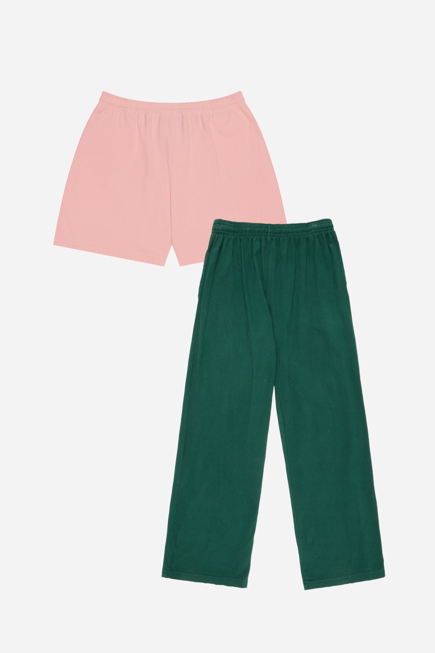 Pink shorts and green pants on a light gray background