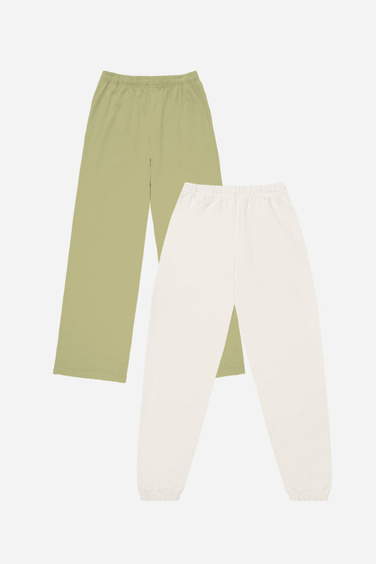 Two pairs of pants, one green and one off-white, on a white background.