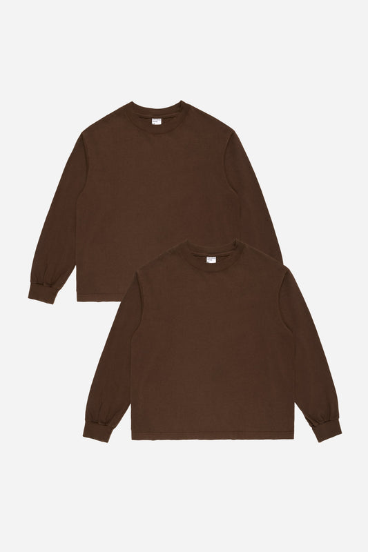 Two brown long-sleeve shirts on a white background