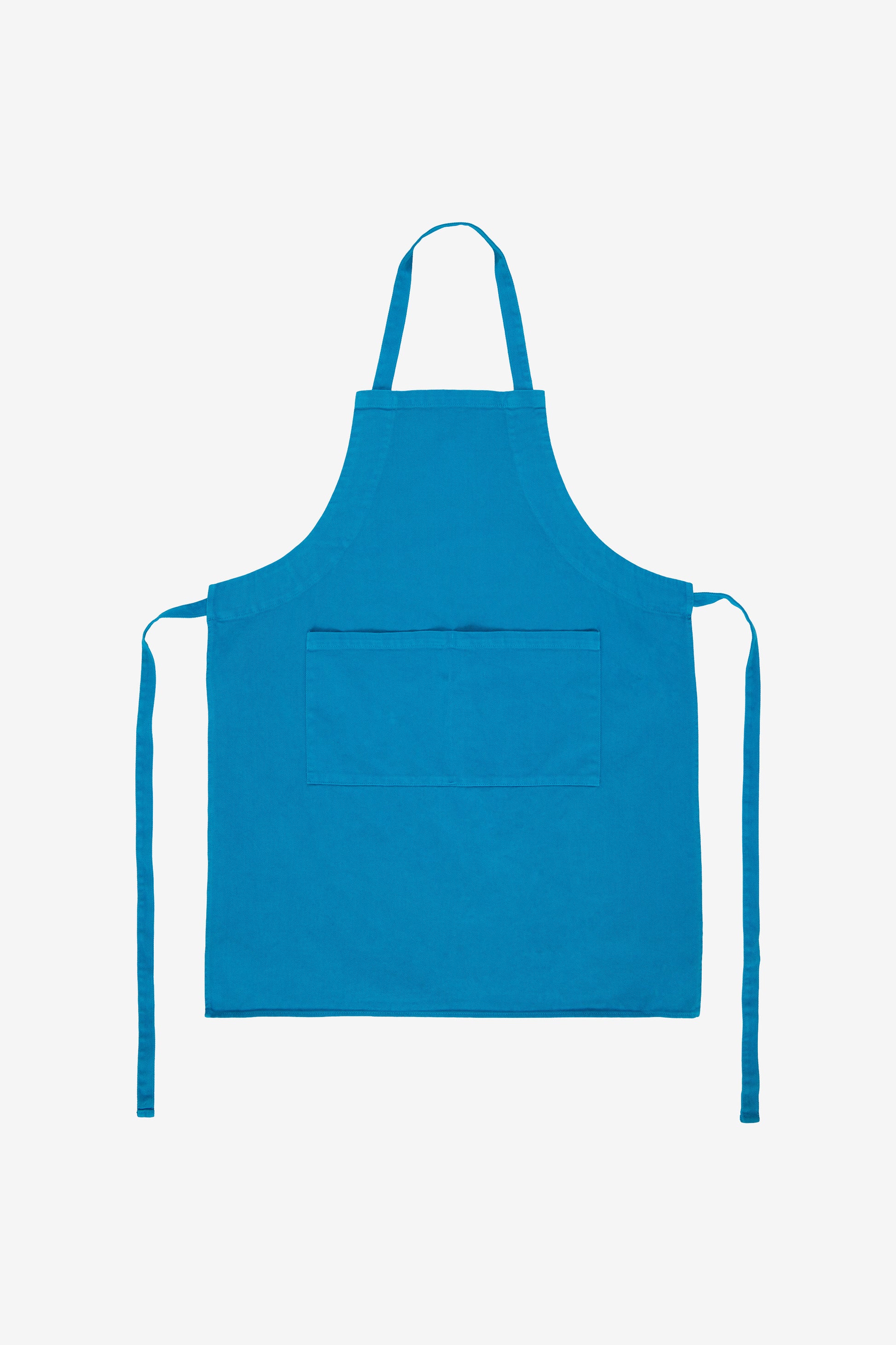Flat lay with straps untied and to the sides of the apron.