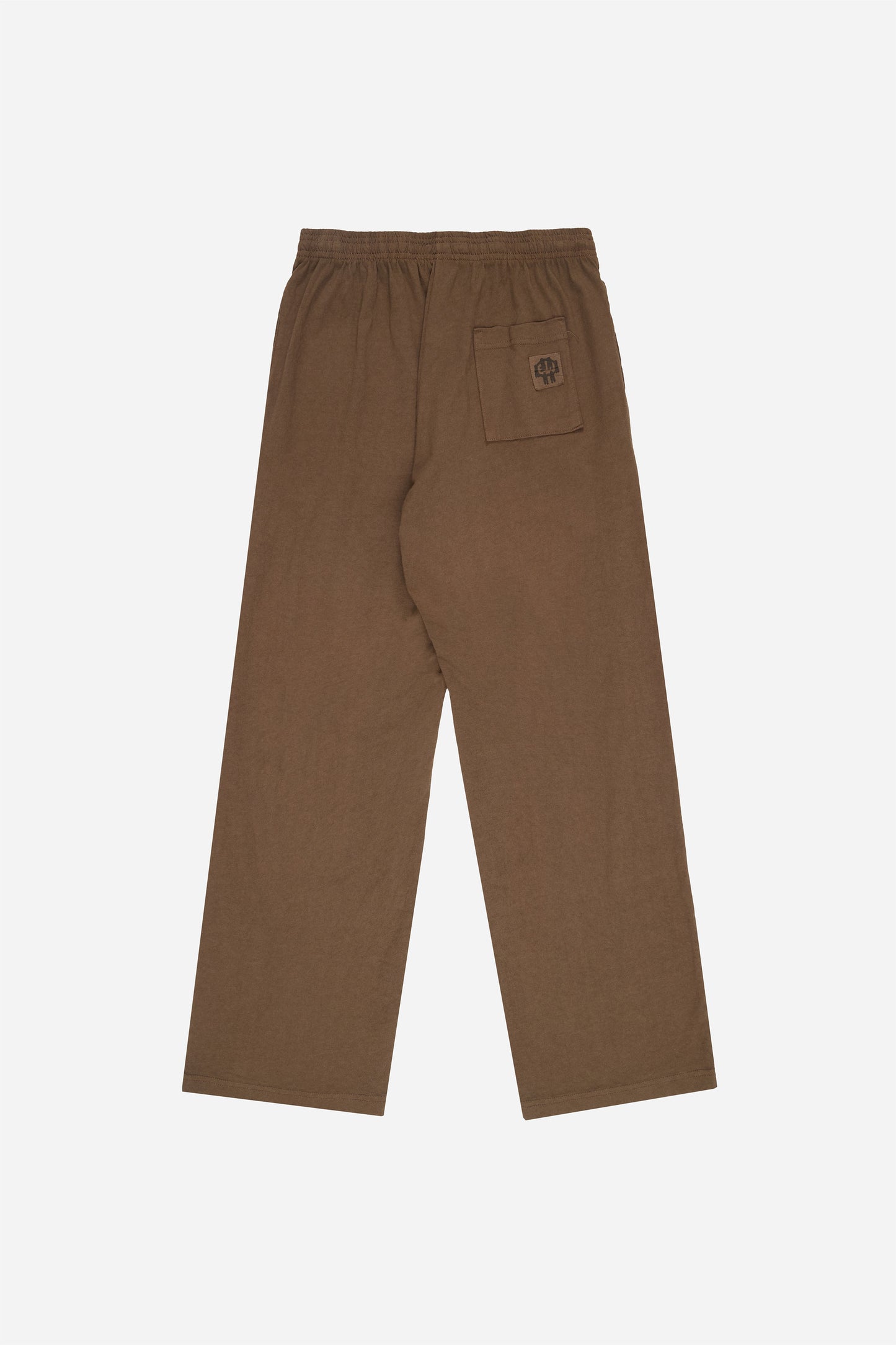 Flat lay of Jerico's Apartment Pants in Dry Soil brown, showing the back of the leg and the pocket detail.