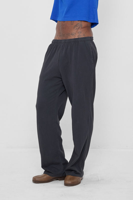 Apartment Pants in Slate – 3/4 front view on model