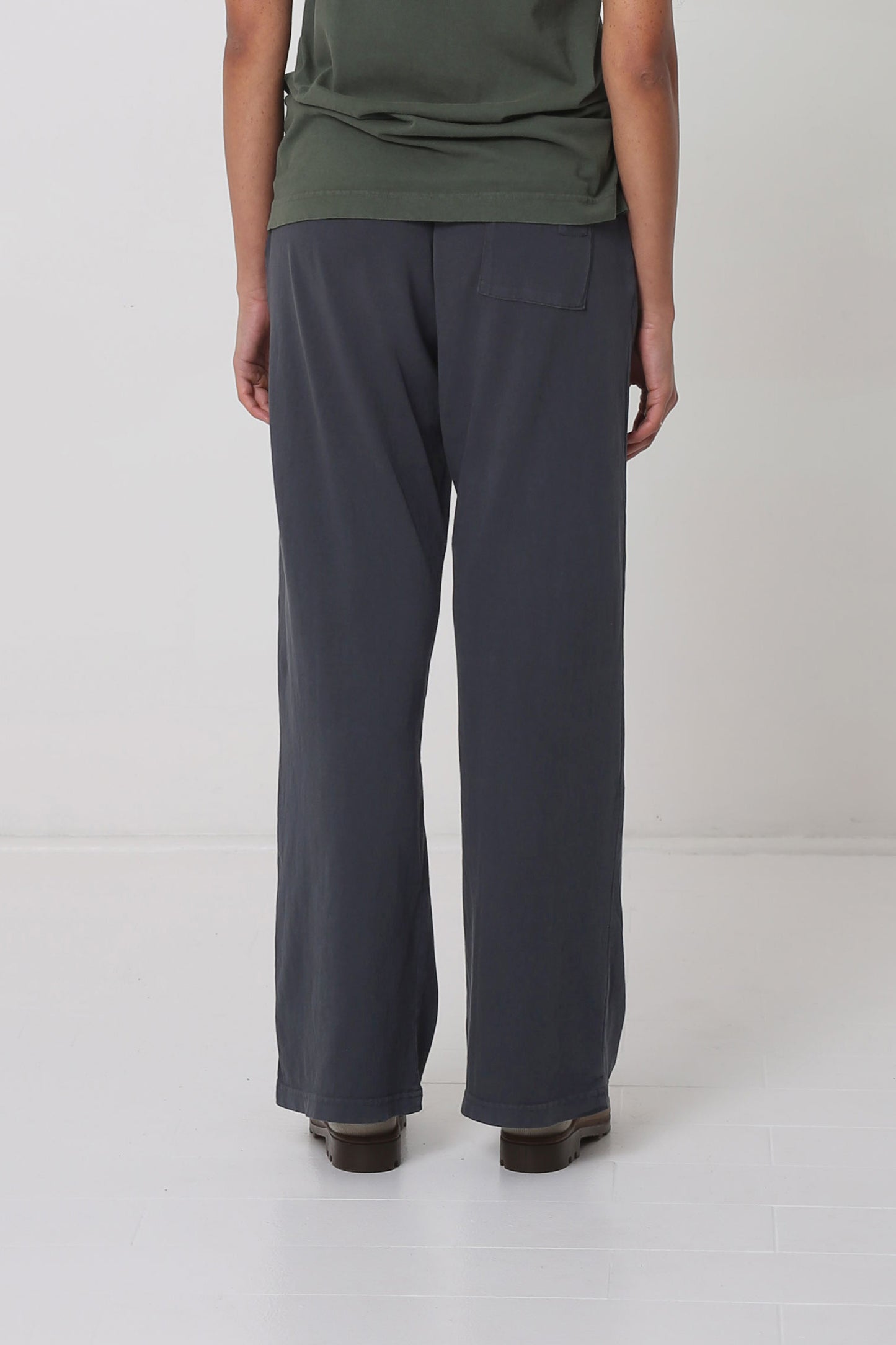 Back view shows a portion of back pocket centered on the right cheek.