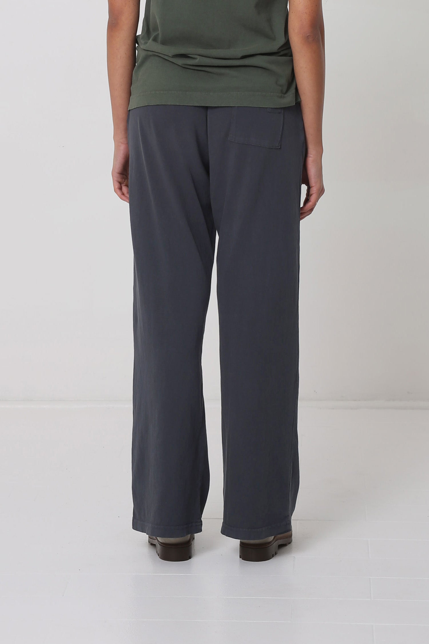 Back view shows a portion of back pocket centered on the right cheek.