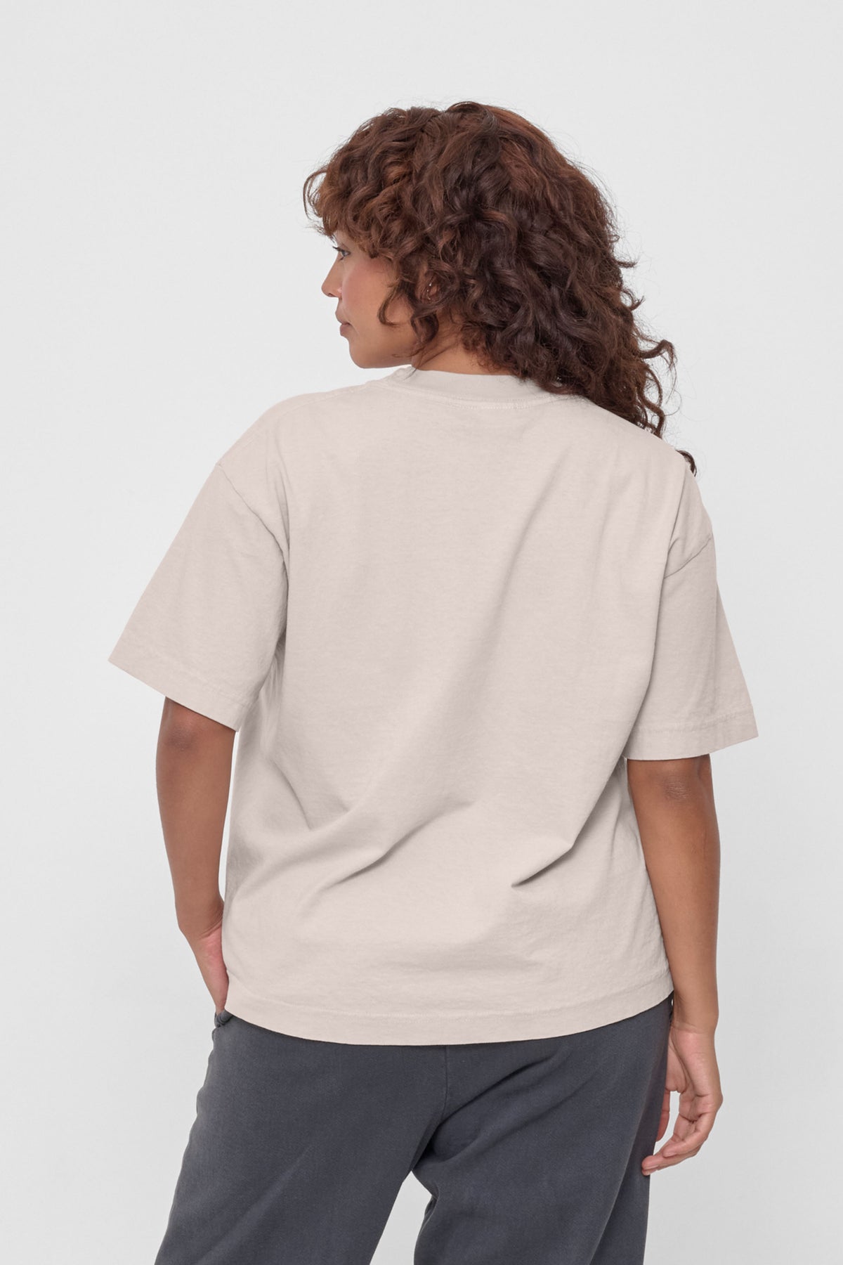 Boxier Trash Tee in Oat – back view on model
