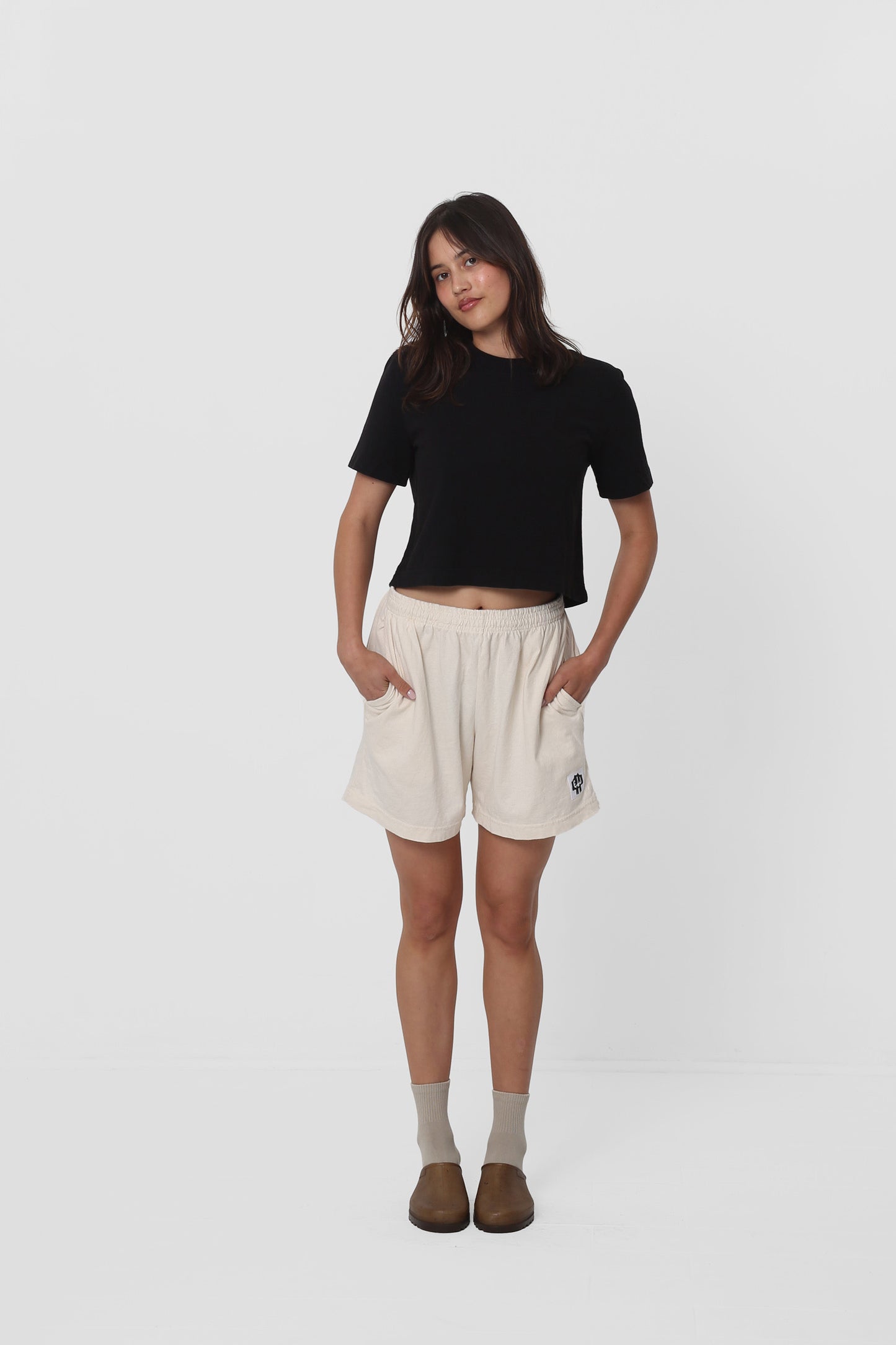 Casually styled with Scour Everyday Shorts.