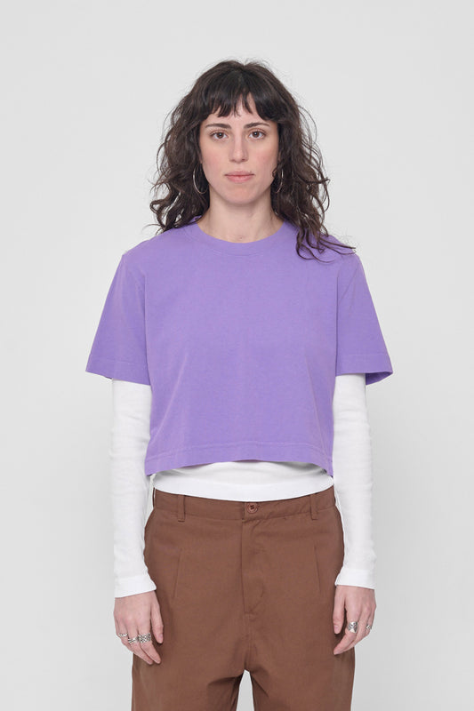 Front view of 5'6" woman wearing size M Carpe Diem Baby Trash Tee. Hem hits above her navel.