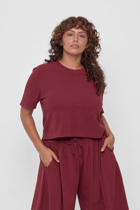 Baby Trash Tee in Garnet – front view on model