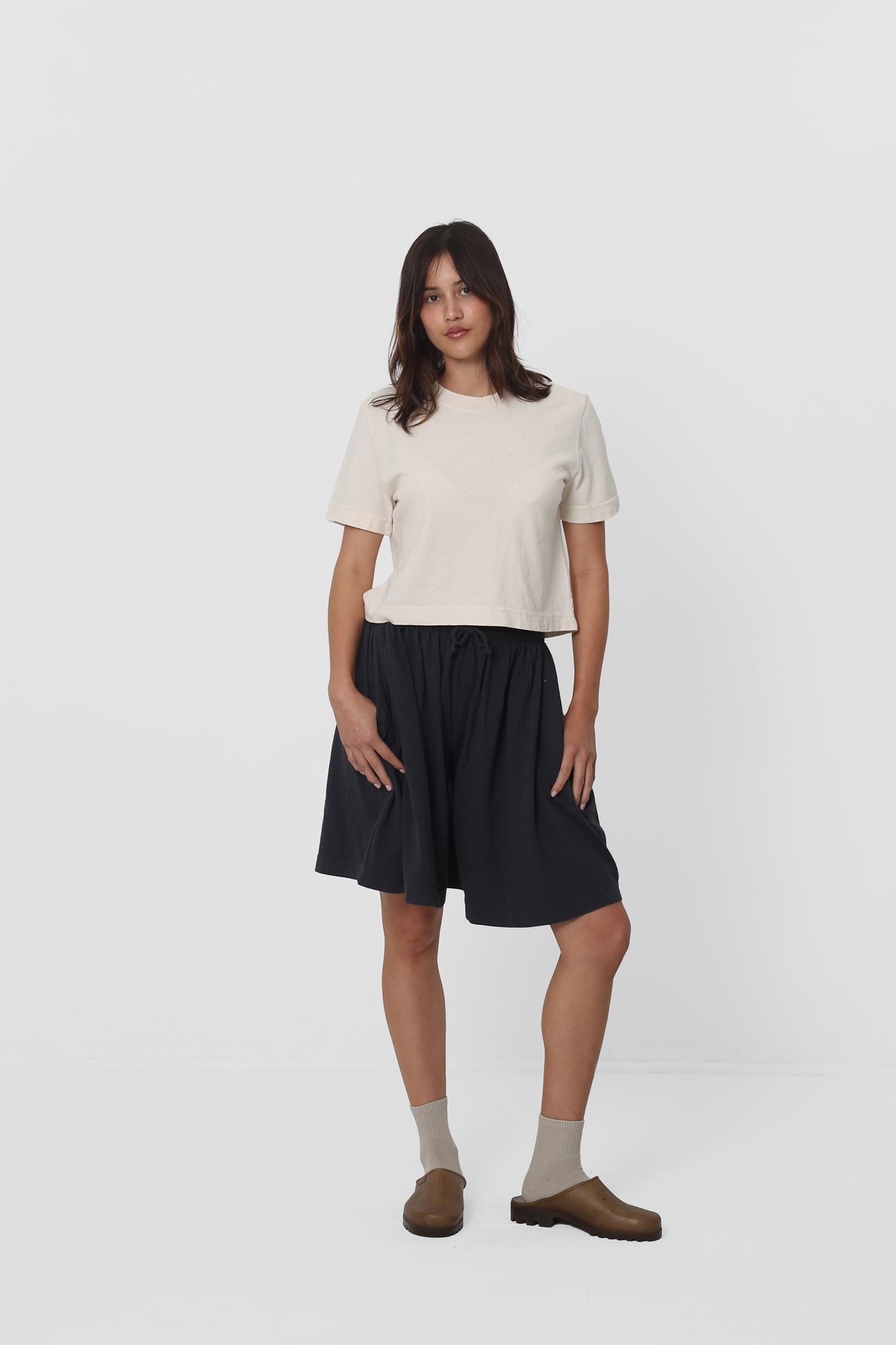 Casually styled with Slate Long Tubular Shorts.