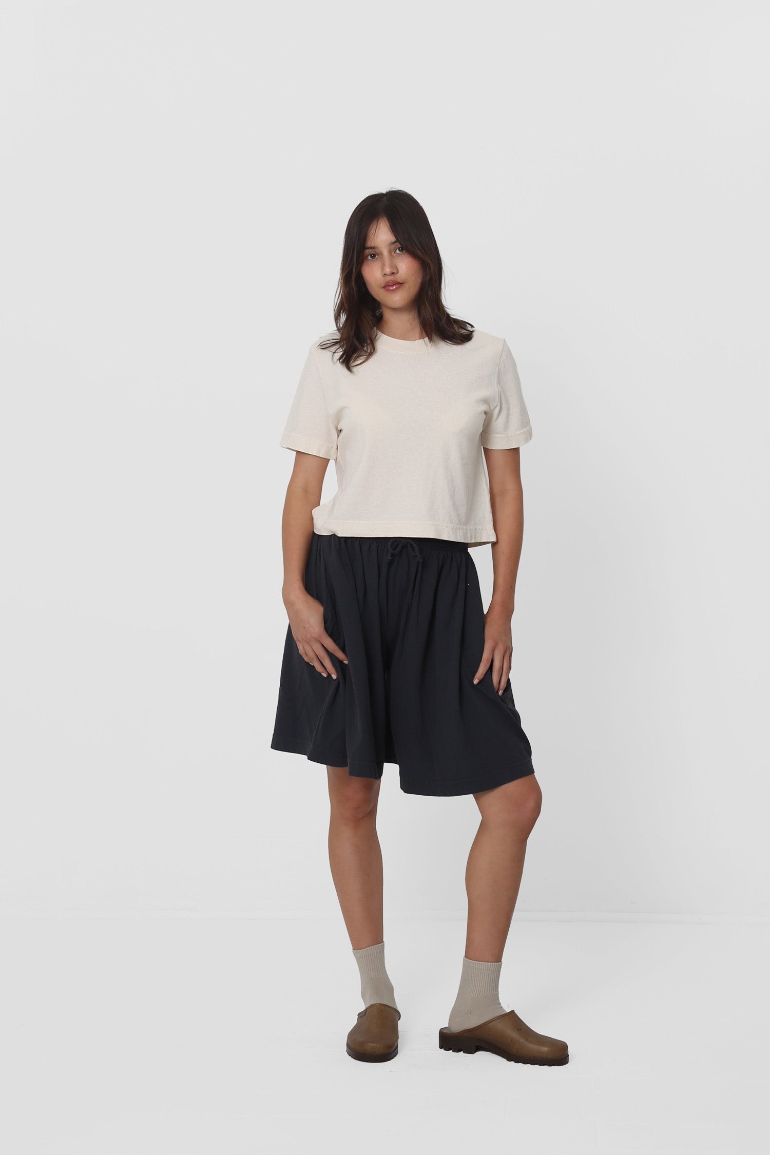 Casually styled with Slate Long Tubular Shorts.