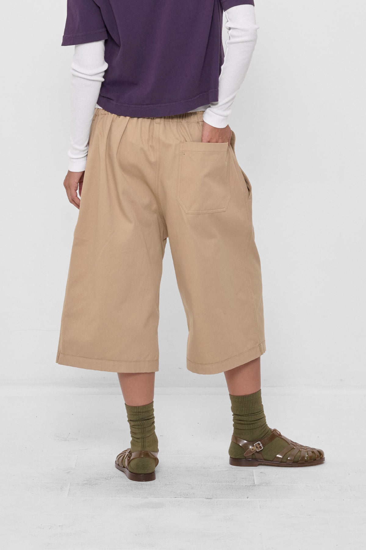 Bermuda Shorts in Sand Storm – styled with White Rib Long Sleeve, Washed Mulberry Baby Trash Tee, and Plasticana sandals