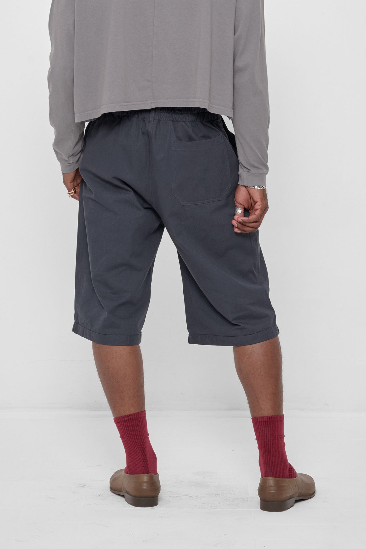 Bermuda Shorts in Slate – back view on model