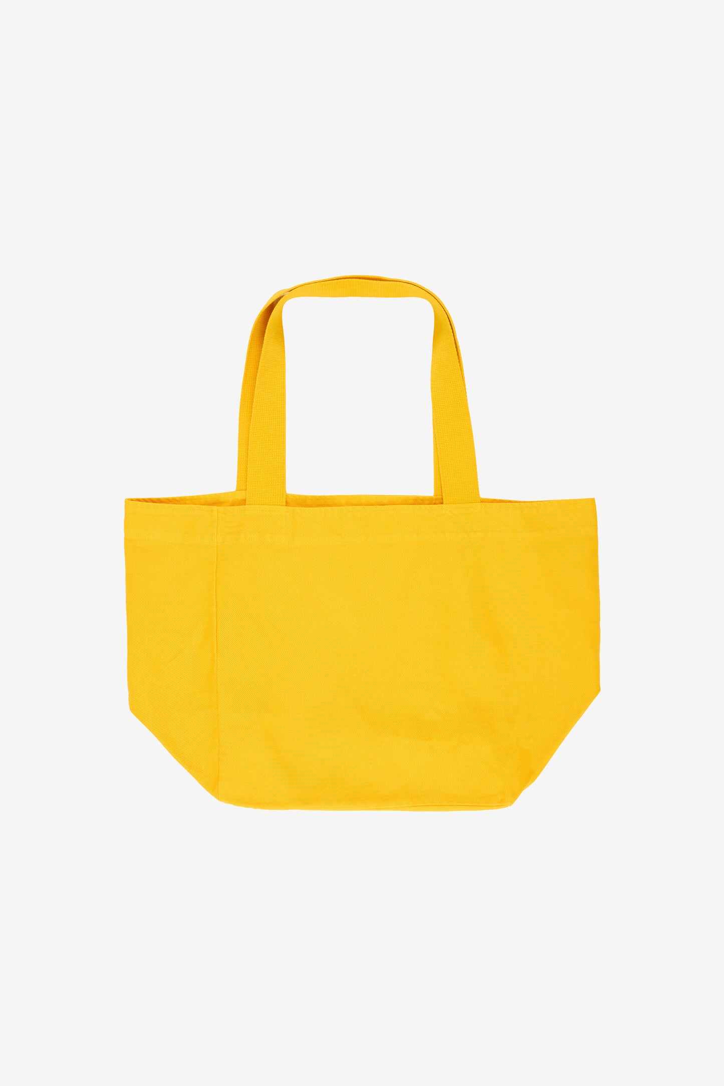 Flat lay showing depth, stitching, and web straps.