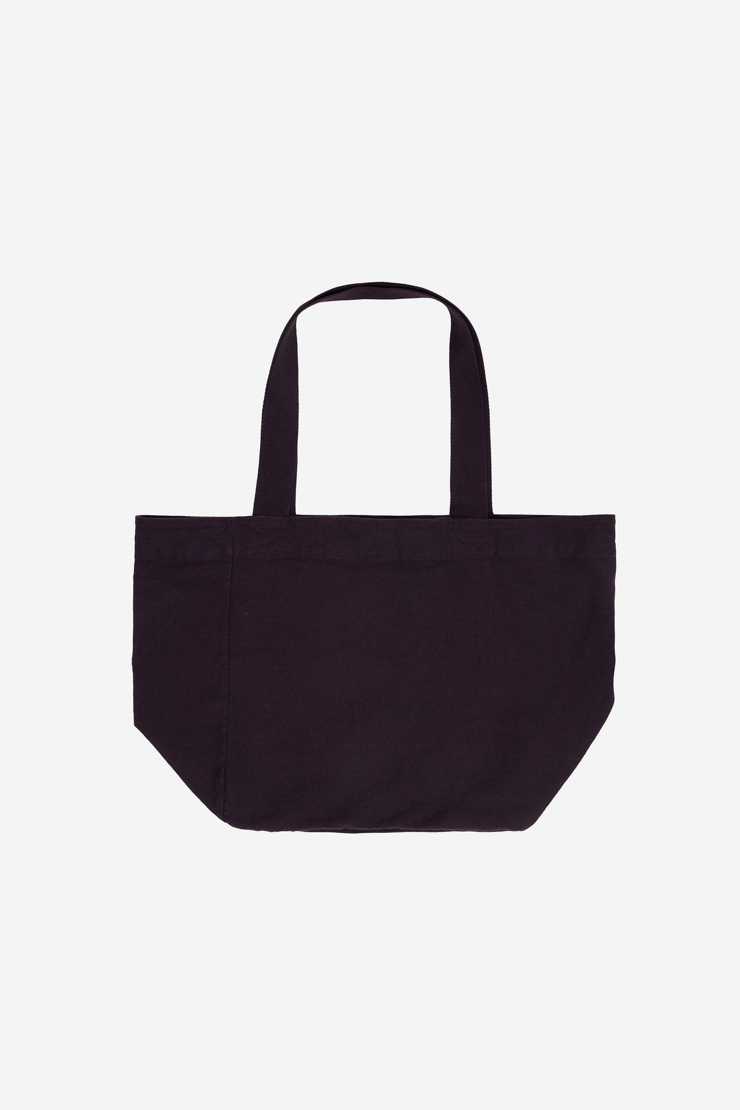 Flat lay of Big Tote in Mulberry dark purple, showing depth, stitching, and web straps.