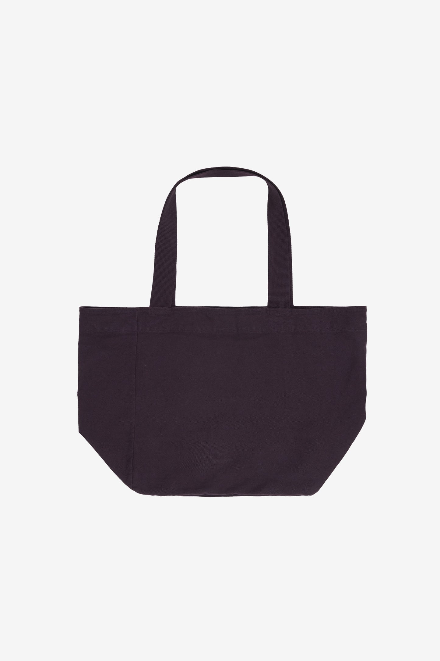 Flat lay showing depth, stitching, and web straps.