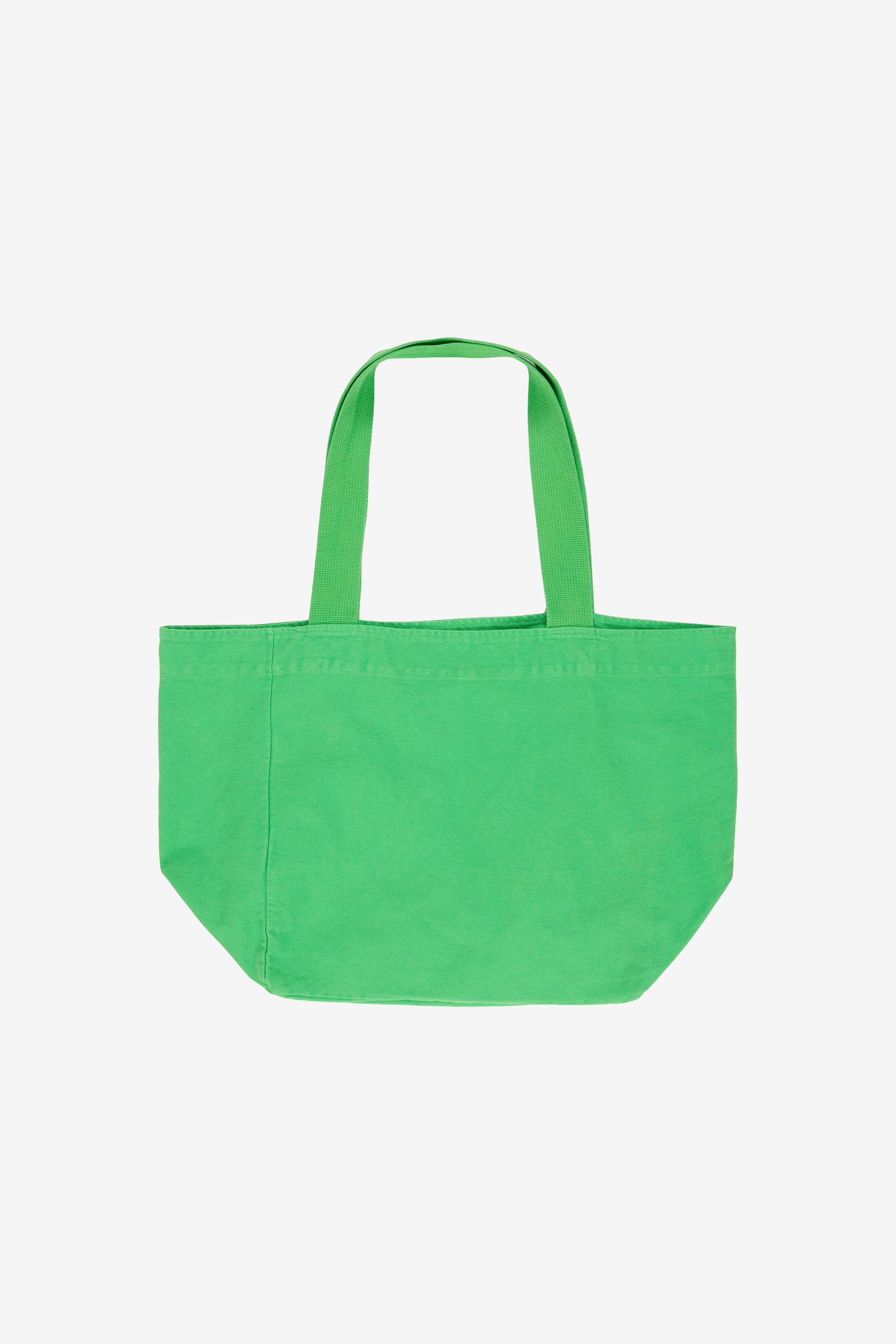 Flat lay showing depth, stitching, and web straps.