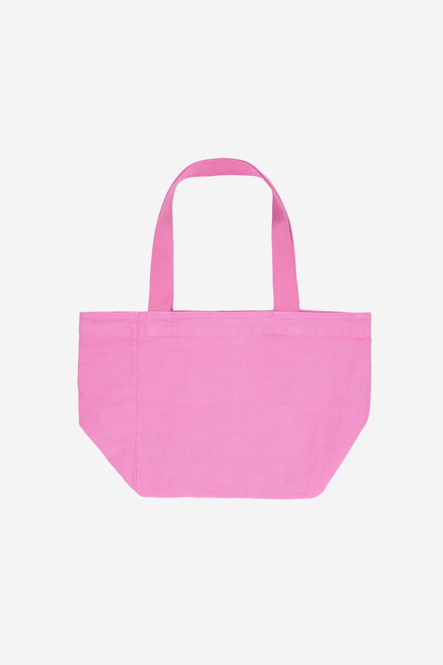 Flat lay of Big Tote in Pixie light pink, showing depth, stitching, and web straps.