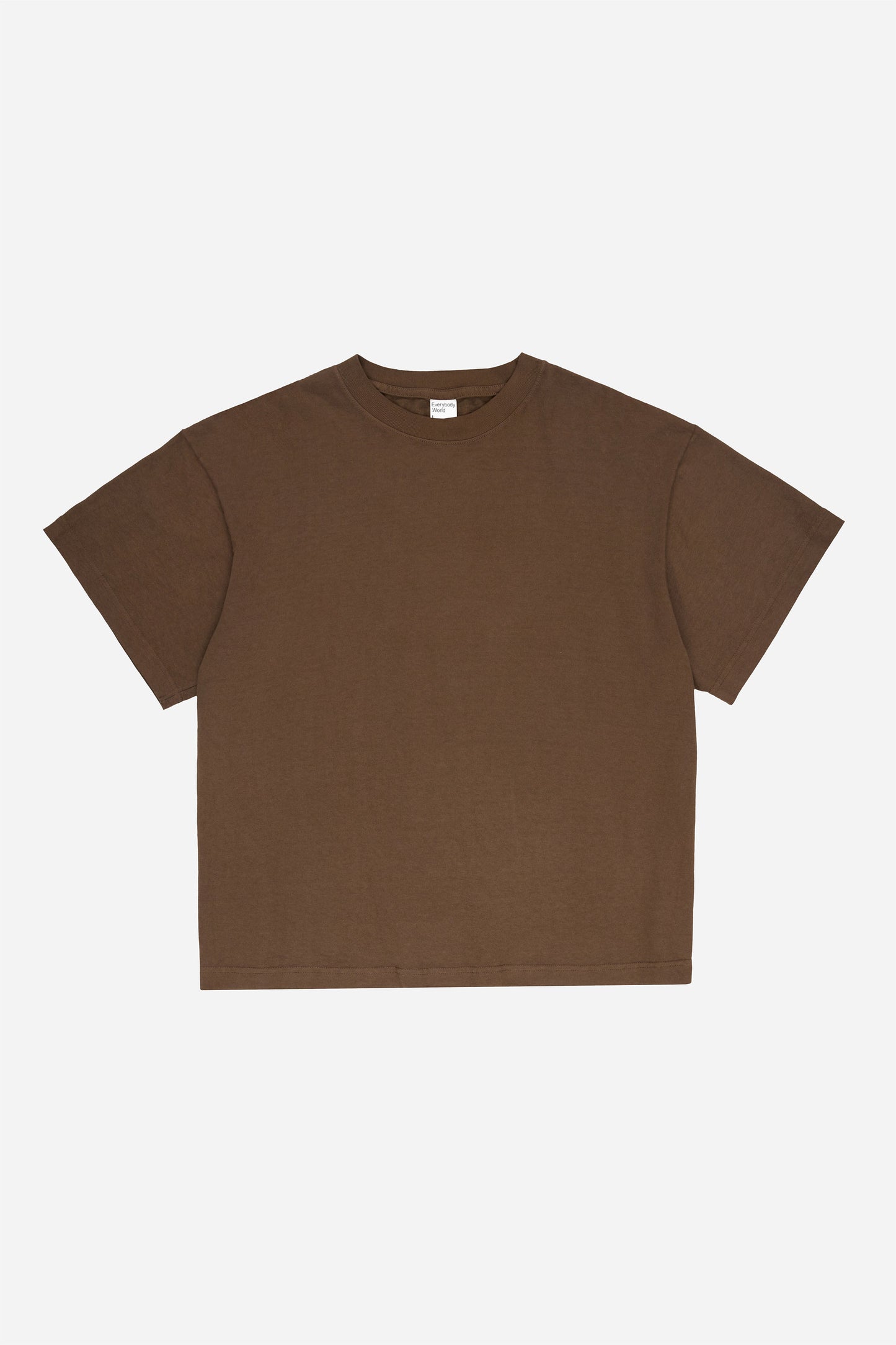 Flat lay of Dry Soil brown Boxier Trash Tee showing the cut of the t-shirt.
