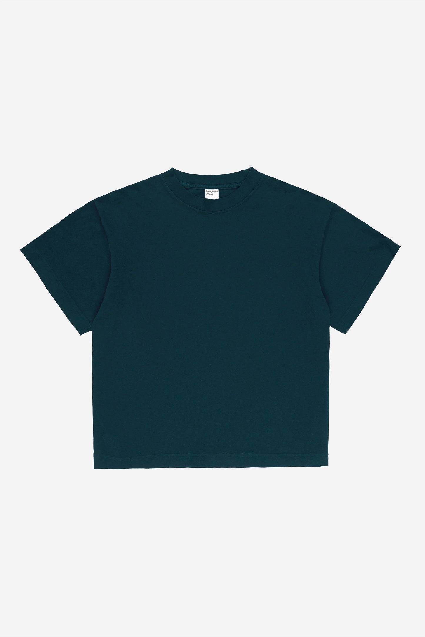 Flat lay of Juniper dark teal Boxier Trash Tee showing the cut of the t-shirt.