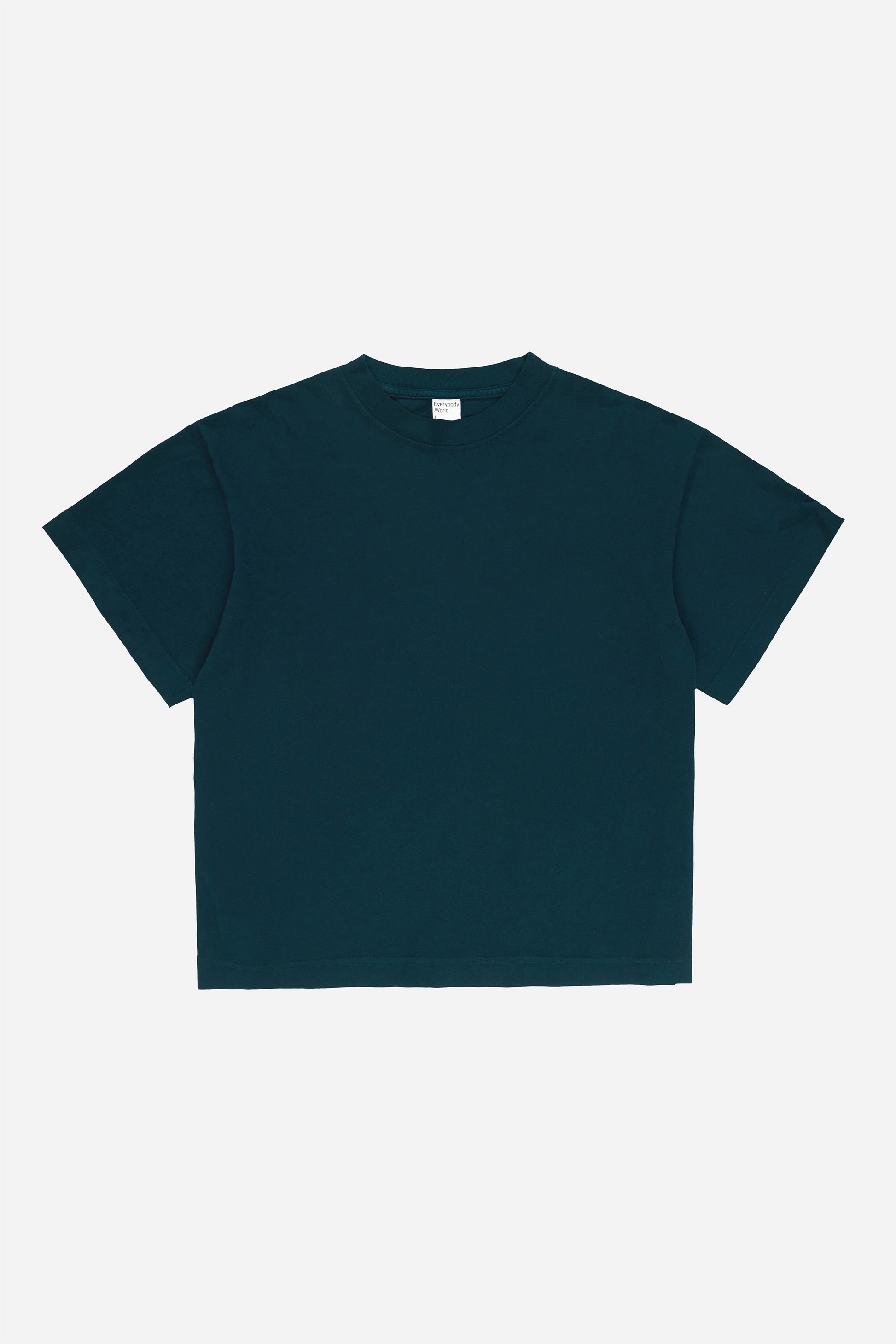 Flat lay of Juniper dark teal Boxier Trash Tee showing the cut of the t-shirt.
