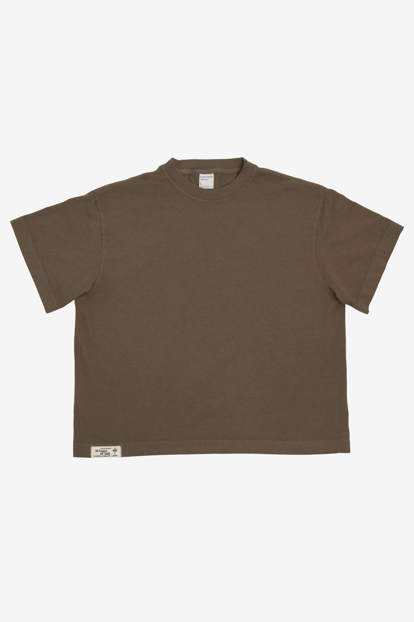 Flat lay showing the square-like boxy cut of the t-shirt.
