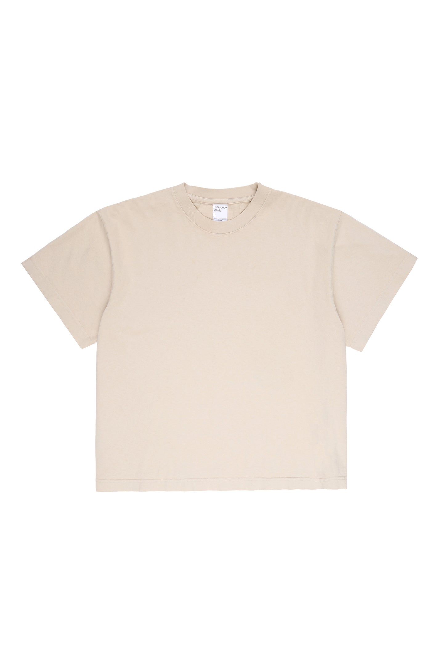 Flat lay of Oat beige Boxier Trash Tee showing the cut of the t-shirt.